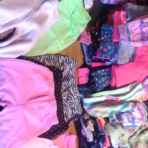 Eight pair of kids size 6 to 9 pants